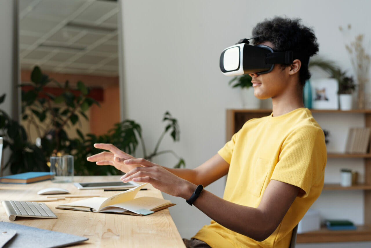 A teenager using virtual reality headset